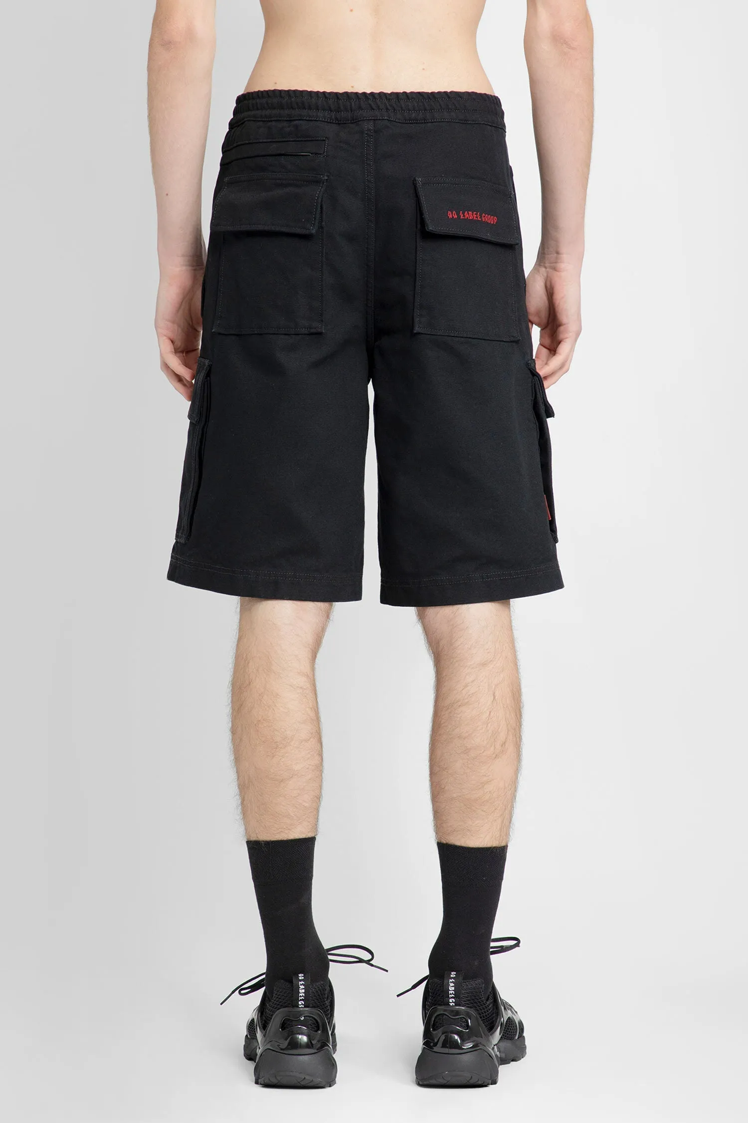 44 LABEL GROUP MAN BLACK SHORTS & SKIRTS